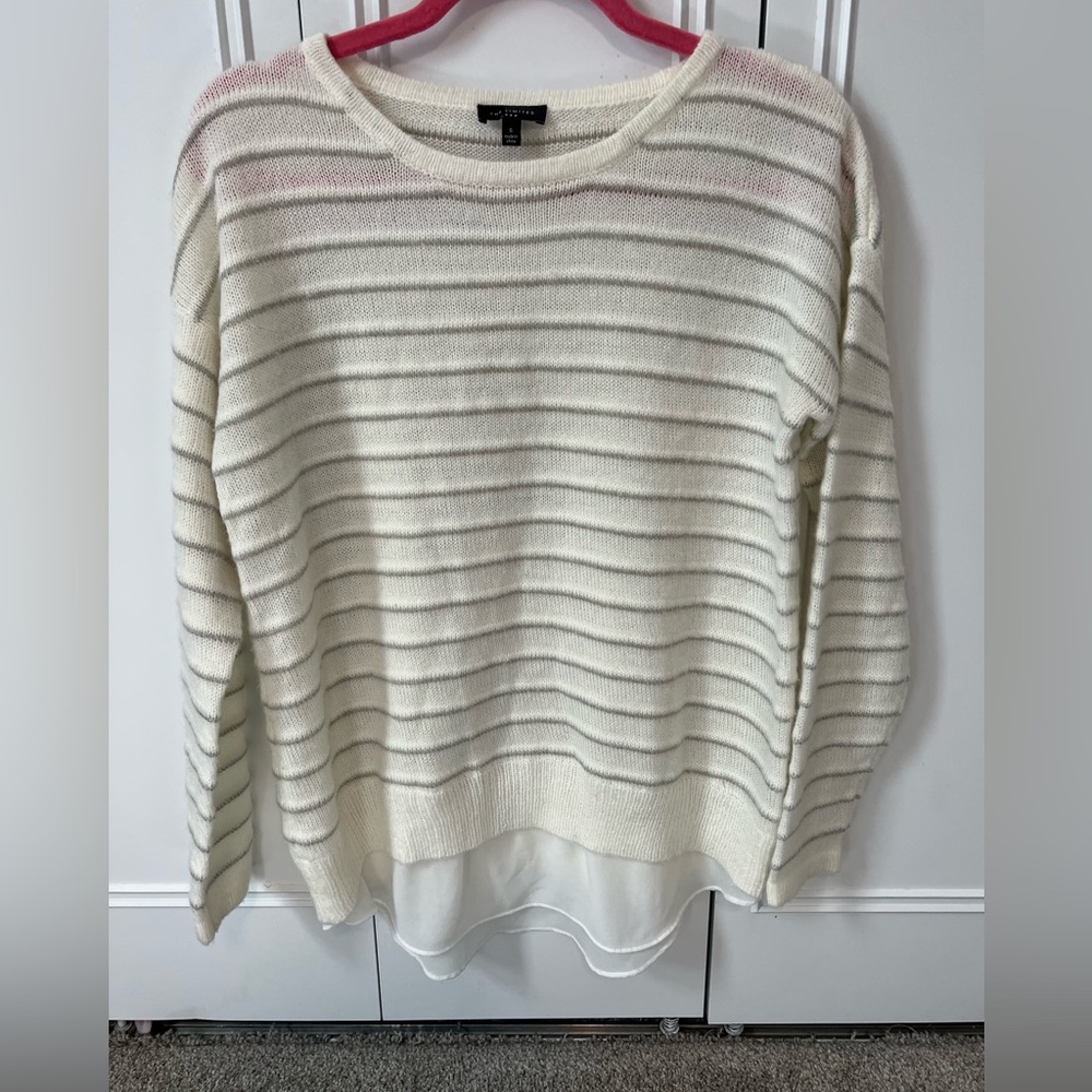 Sweater with mesh detail around the bottom